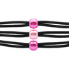 Black cord with three pink beads on a white background