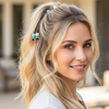 Woman with styled hair featuring hair accessories outdoors